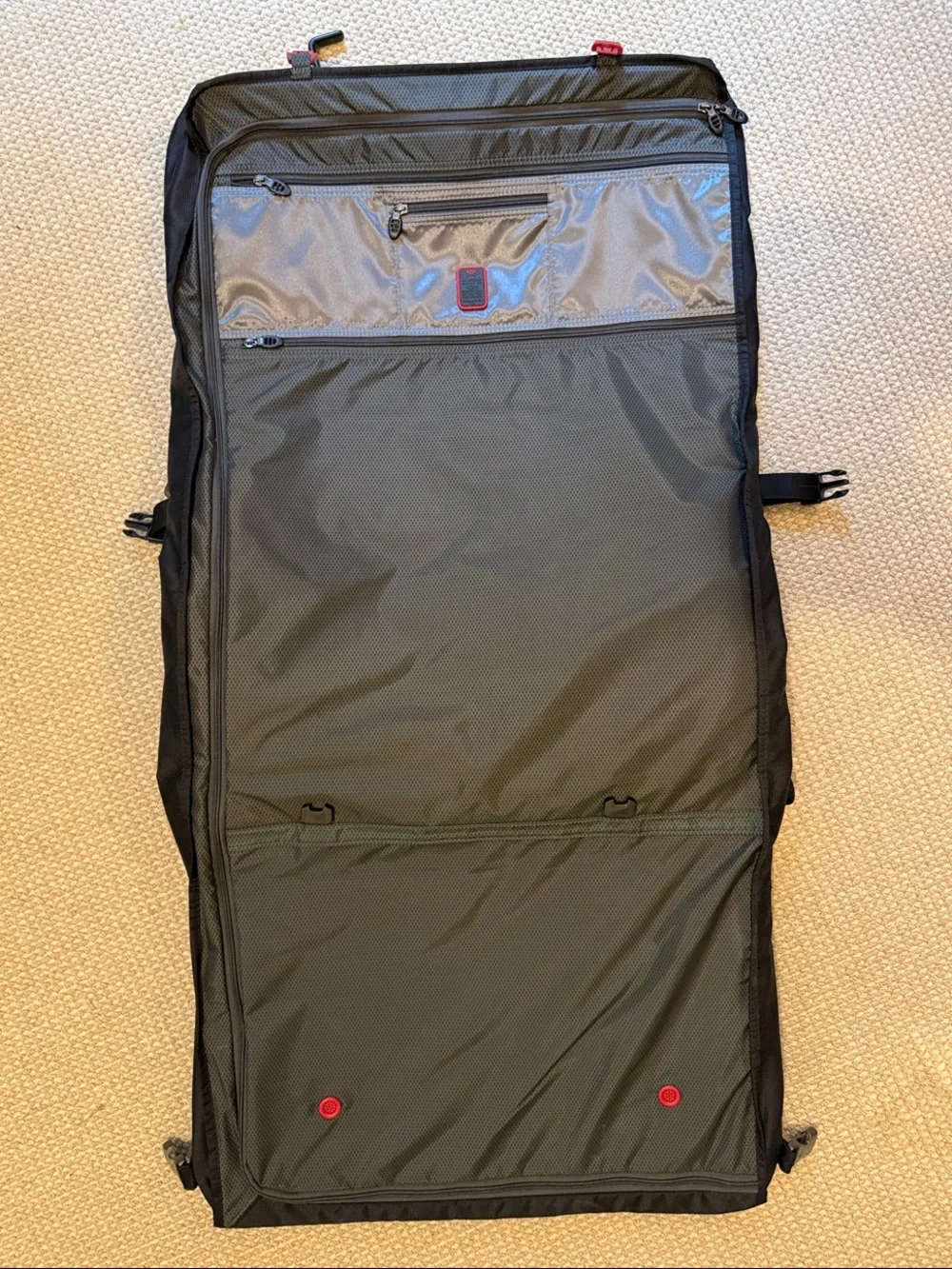 Tumi Tech Black TriFold lightweight Garment Bag with Adjustable Shoulder Strap.